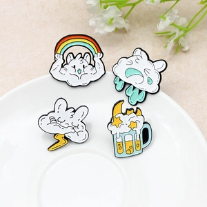 Set of four creative cartoon cloud enamel pins with rainbow and lightning designs