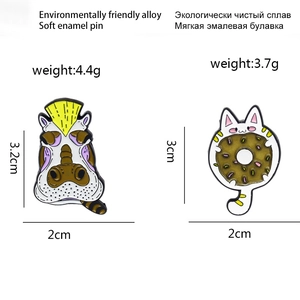 Cartoon animal enamel pins set featuring a hippo with cigar and a cat with doughnut
