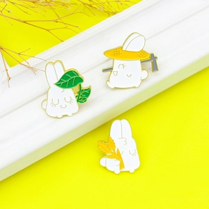 Three-piece cartoon rabbit enamel brooch set with gardening themes and colorful finishes