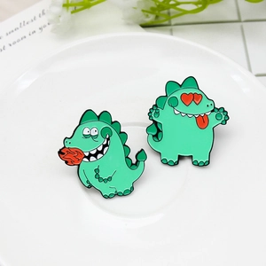 Cute green cartoon dinosaur enamel pins set with fire-breathing and heart-eye designs