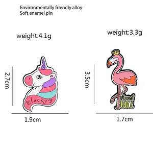 Enamel alloy brooches featuring a colorful unicorn and a crowned flamingo with sizes