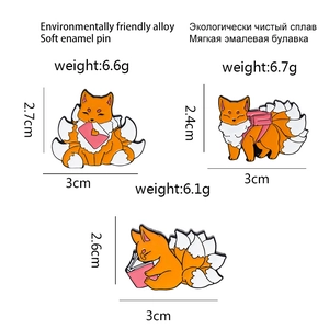 Three-piece cartoon nine-tailed fox enamel pin set with orange and white colors