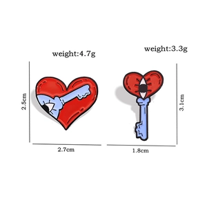 Creative surreal heart and eye enamel pins with dimensions and weight info