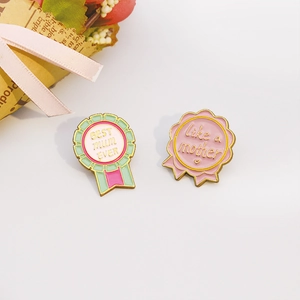 Two enamel pins set with gold plating, Best Mum Ever medal and floral Like a Mother design