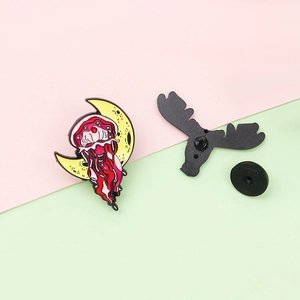 Colorful jellyfish on moon and black deer head enamel pins on pastel background