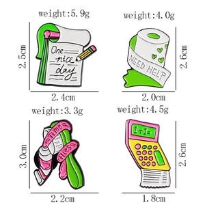 Detailed view of enamel pins showing sizes and weights for notebook and calculator styles