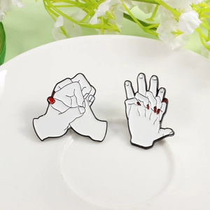 Creative enamel hand pins set for couples with red nails and heart connection design