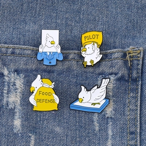 Set of 4 cute cartoon white parrot enamel pins on denim pocket for backpack decor