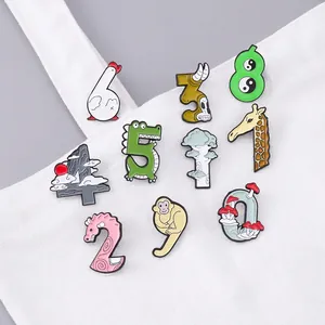 Ensemble créatif de pin's en émail avec chiffres colorés de zéro à neuf et motifs d'animaux