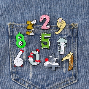 Collection de broches chiffres 0-9 en émail avec motifs animaux et nature sur jean
