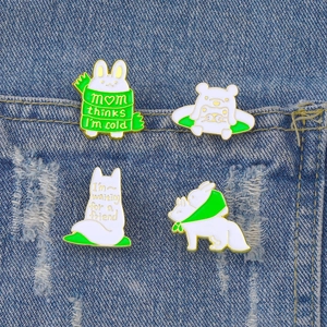 Cute bunny and white bear enamel pins set on denim, cartoon animal brooch collection