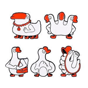 Whimsical white goose enamel pins set with creative cartoon animal designs in red and white