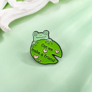 Cute green enamel frog pin with lily pad and pink heart for clothes and bags decoration