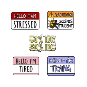 5-piece enamel pin set with creative English slogans like Hello I am Tired on white background