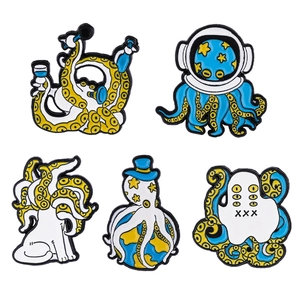 Set of five creative enamel octopus brooches featuring space and travel themed designs