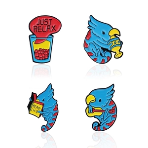 Set of 4 cute blue parrot enamel pins featuring reading and guitar playing designs