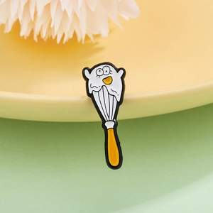 Creative whisk enamel brooch with fried egg character on yellow ceramic plate