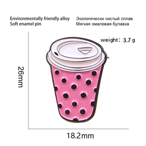 Detail showing dimensions of pink polka dot cup enamel pin with metal clutch backing