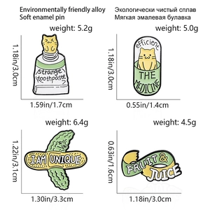 Set of creative enamel pins featuring a cat in toothpaste, medicated capsule, and cucumber