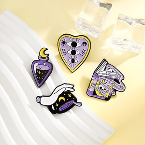 Set of four magical enamel pins featuring a skull spellbook, moon bottle, and potion
