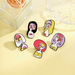 5-piece set of abstract enamel pins featuring creative artistic faces in bold vibrant colors