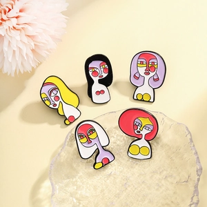 5-piece set of artistic enamel pins with abstract female portraits in vibrant pop art colors