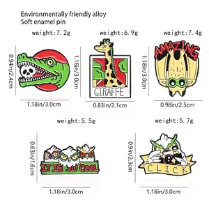 Creative enamel pins featuring giraffe, owl photographer, and crocodile skull badges