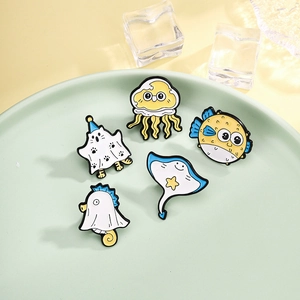 Cute cartoon ocean animal enamel pins featuring jellyfish and seahorse in pastel colors