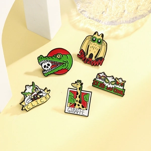 Cartoon enamel pin set with giraffe camera, owl group, and crocodile skull designs