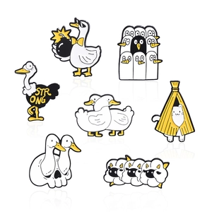 Whimsical set of 7 cartoon animal enamel pins featuring a white goose, ostrich, and cat