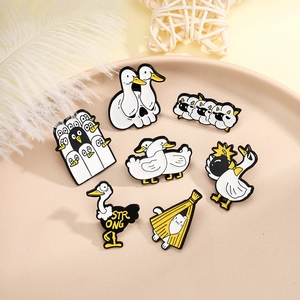 Creative 7-piece set of funny animal enamel pins featuring ducks, penguins, and cats