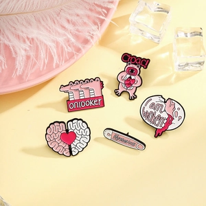 Originelles Emaille-Broschen-Set mit Gehirn-Herz und skurrilen Frosch-Designs auf Gelb