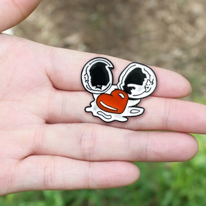 Artistic metal enamel heart brooch with cartoon eyes and hand-drawn doodle style