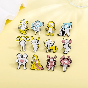 Flat lay of 12 creative cartoon zodiac enamel pins with cute personified designs