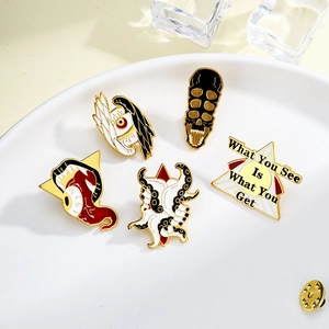 5pcs Halloween enamel pin set featuring surrealist eye, skull, and octopus designs
