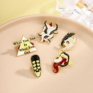 Collection of five creative enamel pins with unique eye and gothic Halloween designs