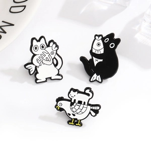 Three-piece set of cat and rooster enamel pins with cute black and white feline designs