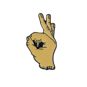 Unique OK hand gesture enamel pin with trendy yellow and black finish for casual wear