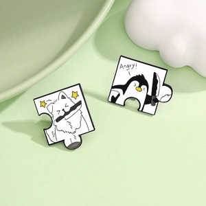Cartoon penguin and dog enamel pin set with puzzle design on light green background
