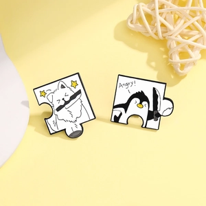 Funny cartoon dog and penguin puzzle enamel pin set with angry lettering on yellow background