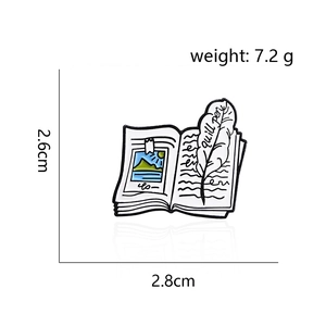 Detail of quill pen and open book enamel brooch with size and weight measurement specs