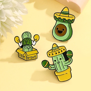 Cartoon enamel pins set featuring boxing cactus and avocado with Mexican sombrero