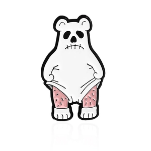 Cartoon monster enamel brooch with winged ears and skull eyes in white and pink