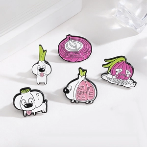 Creative cartoon enamel brooches set featuring onion and garlic dog designs on a white stand