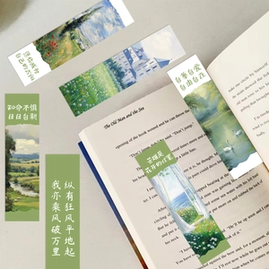 Dettaglio di segnalibri stile Monet con dipinti a olio su un libro aperto