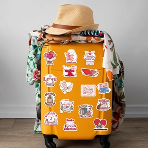 Cartoon Bookish Valentine stickers applied on a yellow suitcase for travel DIY decoration