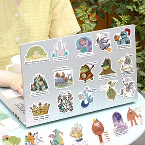Inspirational fairy tale stickers on a laptop with knight and dragon designs