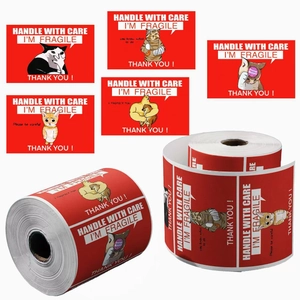 Detail of red fragile meme stickers showing funny cat and dog motifs for shipping