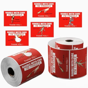 Macro detail of rolls showing funny fragile shipping labels with creative cartoon designs