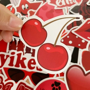 Close-up of cherry cartoon sticker with high-quality waterproof PVC finish for laptops